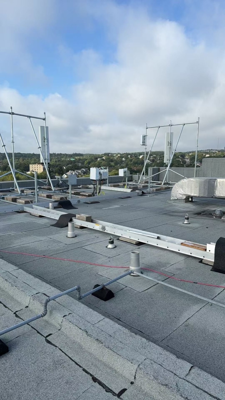 Flat roof membrane detailing around rooftop equipment and supports