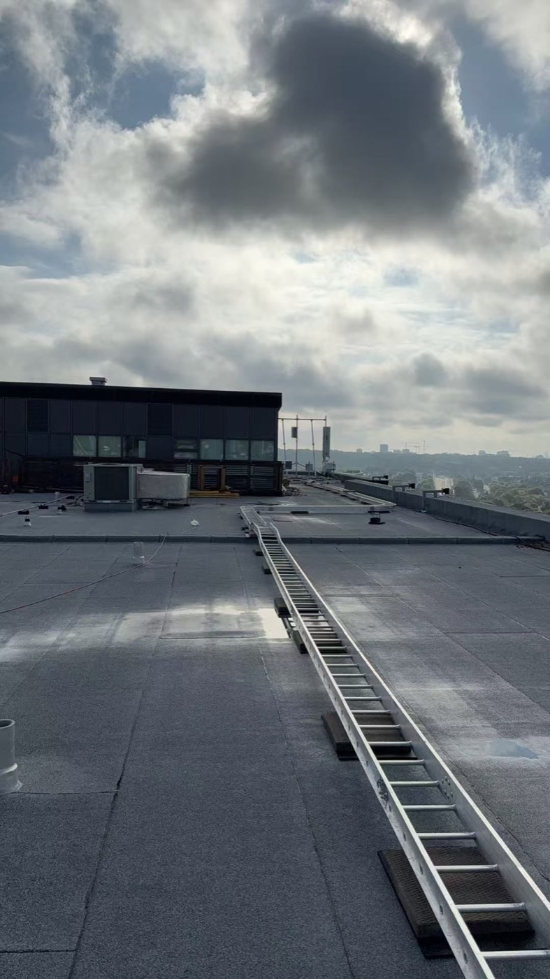 Wide view across the completed commercial flat roof surface
