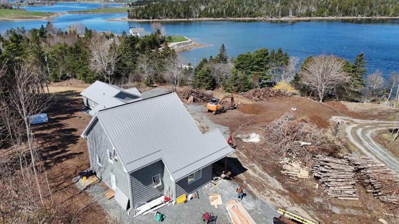 Completed siding installation overlooking the water in Heckmans Island