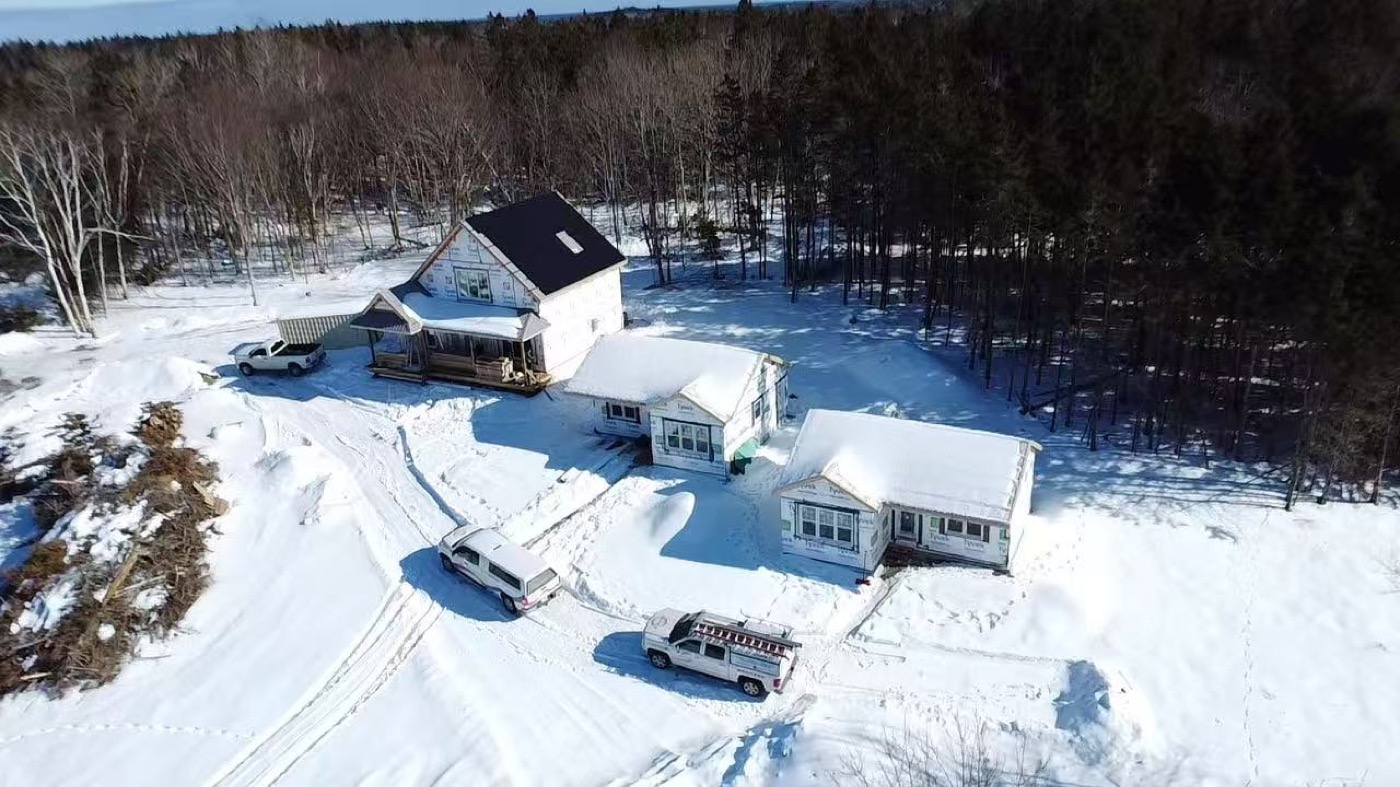Winter aerial view of the buildings during exterior installation
