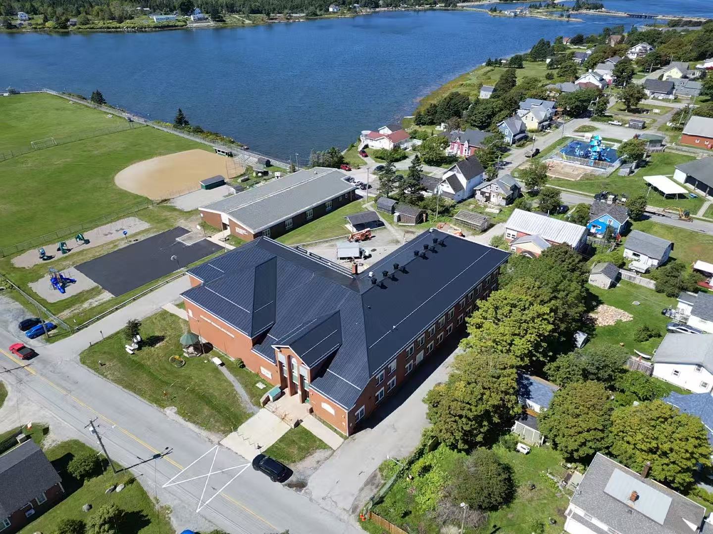 Lakeside aerial view of the completed Lockeport commercial metal roof