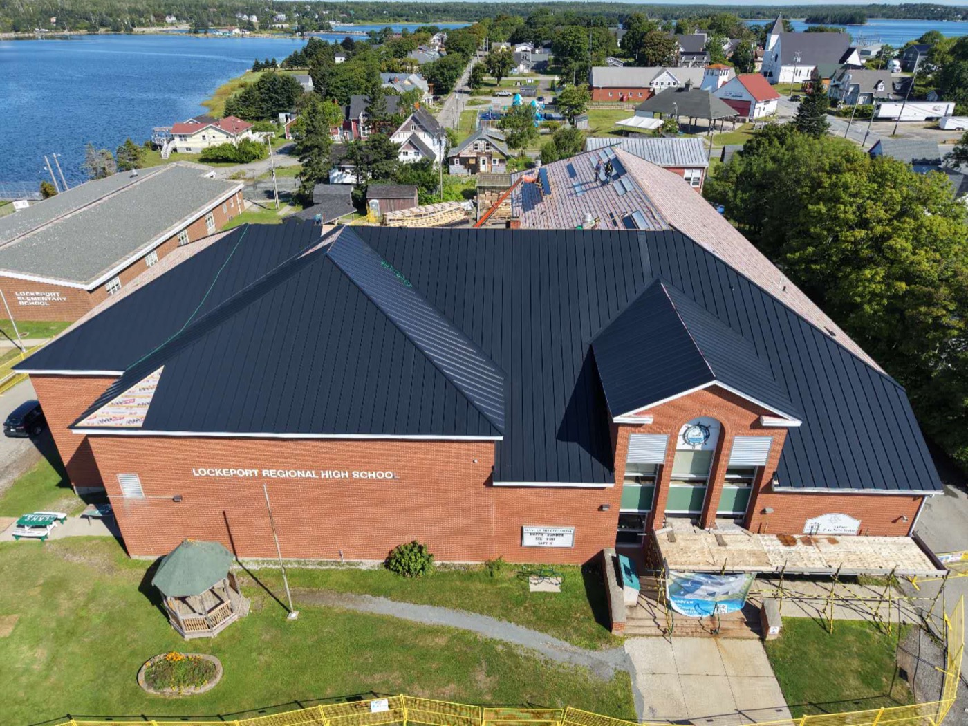 Completed black metal roof at the Locke Street project in Lockeport, Nova Scotia